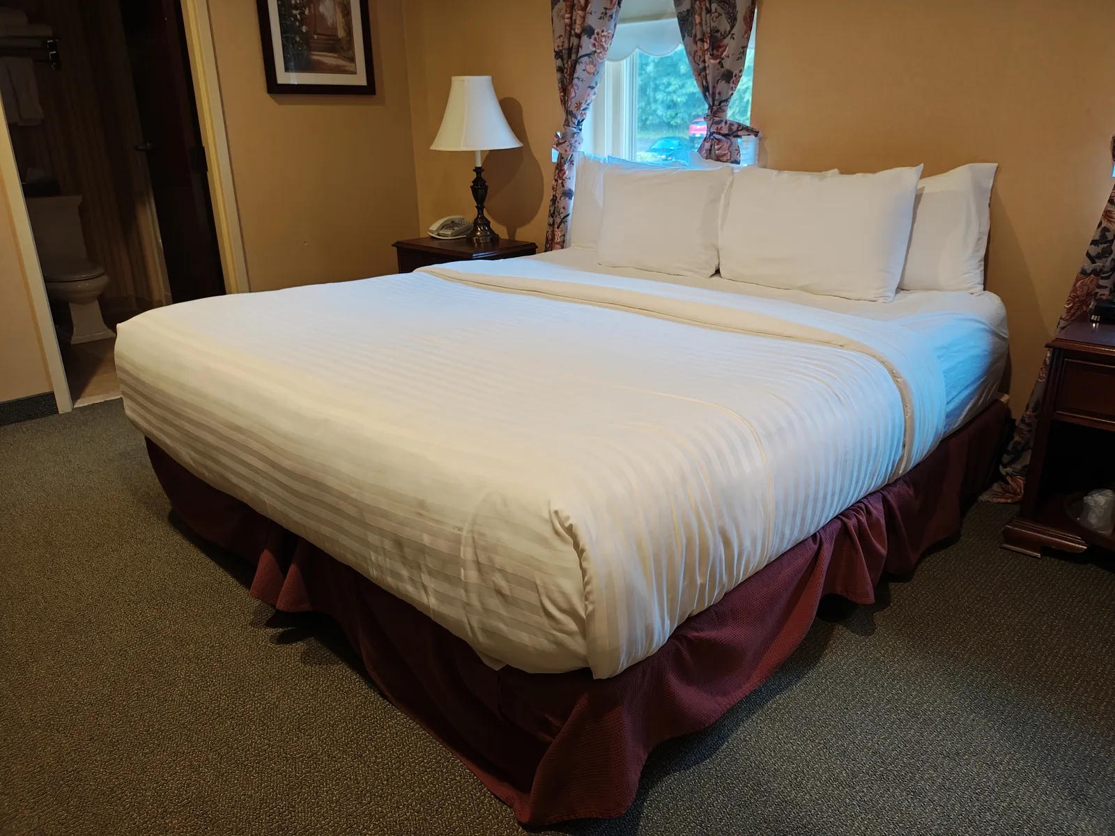 Traditional King Room, wide view of king bed