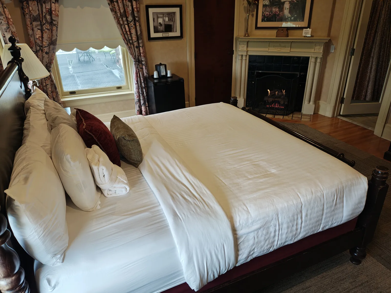 Thomas Watson Suite with lit gas fireplace and antique furnishings
